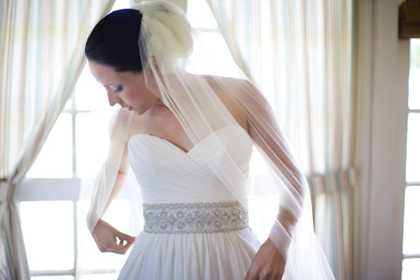 Bride in ballgown dress with jewel encrusted waistband and full-length veil - wedding photo by Melissa Jill Photography
